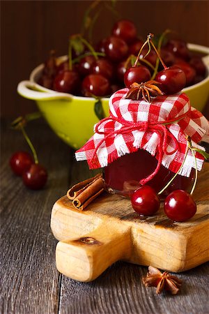 simsearch:400-06639321,k - Delicious cherry jam with spices and fresh cherries on a kitchen table. Stock Photo - Budget Royalty-Free & Subscription, Code: 400-07675966
