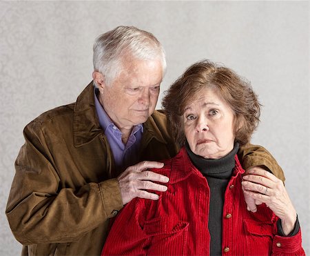 Concerned mature husband comforting depressed senior wife Stock Photo - Budget Royalty-Free & Subscription, Code: 400-07676152
