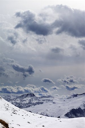 simsearch:400-07211845,k - Evening mountains and cloudy sky. Caucasus Mountains. Georgia, ski resort Gudauri. Stockbilder - Microstock & Abonnement, Bildnummer: 400-07676611