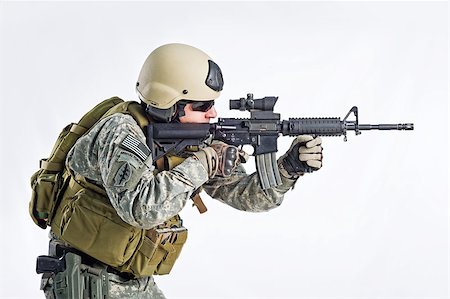 simsearch:6128-08737914,k - SWAT Team Officer on white isolated background Stock Photo - Budget Royalty-Free & Subscription, Code: 400-07676879