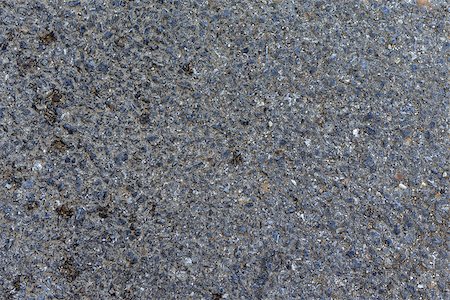 Dark asphalt surface much relief. Close up Stock Photo - Budget Royalty-Free & Subscription, Code: 400-07677397