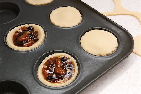 simsearch:400-07677933,k - Mince pies being made - open and finished with plain pastry lids Stock Photo - Budget Royalty-Free & Subscription, Code: 400-07677940