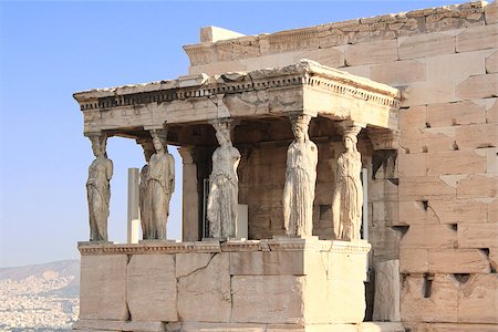 simsearch:400-06922893,k - Sunrise lights the side porch of Caryatides in Erechtheum from Athenian Acropolis, Greece Stock Photo - Budget Royalty-Free & Subscription, Code: 400-07678495