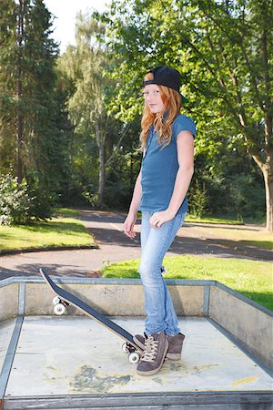 Cool young girl outdoor with skateboard Stock Photo - Budget Royalty-Free & Subscription, Code: 400-07678530