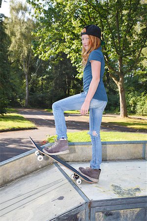 Cool young girl outdoor with skateboard Stock Photo - Budget Royalty-Free & Subscription, Code: 400-07678531