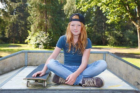 Cool young girl outdoor with skateboard Stock Photo - Budget Royalty-Free & Subscription, Code: 400-07678533