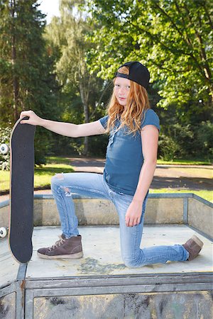 Cool young girl outdoor with skateboard Stock Photo - Budget Royalty-Free & Subscription, Code: 400-07678540