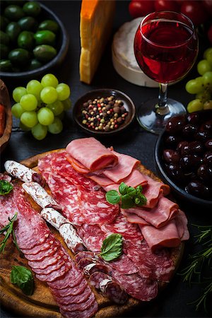 simsearch:400-06082979,k - Meat catering platter with olives and red wine Photographie de stock - Aubaine LD & Abonnement, Code: 400-07678621