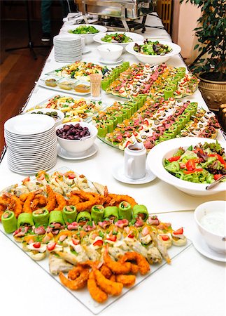 Table with various delicious appetizer Stock Photo - Budget Royalty-Free & Subscription, Code: 400-07678904