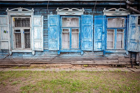 simsearch:400-05343808,k - Old blue wooden wall with some windows Photographie de stock - Aubaine LD & Abonnement, Code: 400-07678945