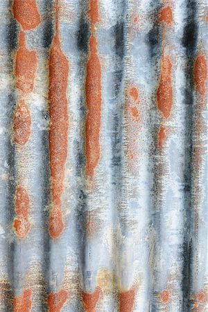 simsearch:400-07679105,k - Vertical corrugated iron sheet with patches of rust as abstract background texture Foto de stock - Super Valor sin royalties y Suscripción, Código: 400-07679106