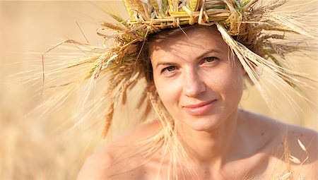 woman in field of wheat Stock Photo - Budget Royalty-Free & Subscription, Code: 400-07679311