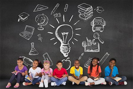 simsearch:400-07684098,k - Cute pupils smiling at camera with books against black wall with school doodles Stock Photo - Budget Royalty-Free & Subscription, Code: 400-07684021