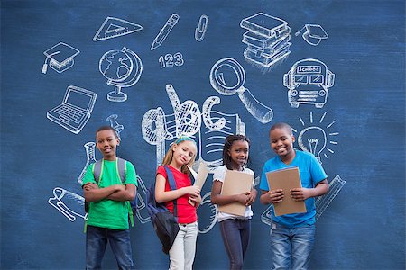 simsearch:400-07683620,k - Cute pupils smiling at camera  against blue chalkboard with school doodles Foto de stock - Royalty-Free Super Valor e Assinatura, Número: 400-07684022