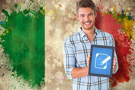 simsearch:400-06876753,k - Young student showing tablet pc  against grunge italy flag Photographie de stock - Aubaine LD & Abonnement, Code: 400-07684035