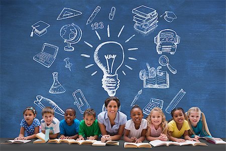 simsearch:400-07684098,k - Cute pupils smiling at camera with teacher against blue chalkboard Stock Photo - Budget Royalty-Free & Subscription, Code: 400-07684031