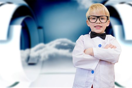 futuristic boy kid - Cute pupil dressed up as teacher against cloud in a futuristic structure Stock Photo - Budget Royalty-Free & Subscription, Code: 400-07684076