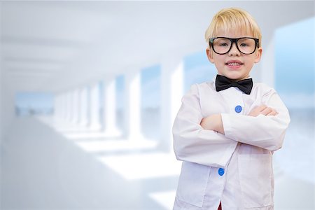 simsearch:400-07684082,k - Cute pupil dressed up as teacher against bright white room with columns Stock Photo - Budget Royalty-Free & Subscription, Code: 400-07684077