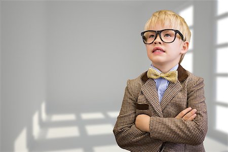 simsearch:400-07684082,k - Cute pupil dressed up as teacher  against white room with windows Stock Photo - Budget Royalty-Free & Subscription, Code: 400-07684086