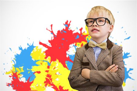 simsearch:400-07684082,k - Cute pupil dressed up as teacher  against white background with paint splashes Stock Photo - Budget Royalty-Free & Subscription, Code: 400-07684089