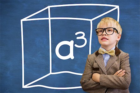 simsearch:400-07684082,k - Cute pupil dressed up as teacher  against blue chalkboard with a cubed Stock Photo - Budget Royalty-Free & Subscription, Code: 400-07684104