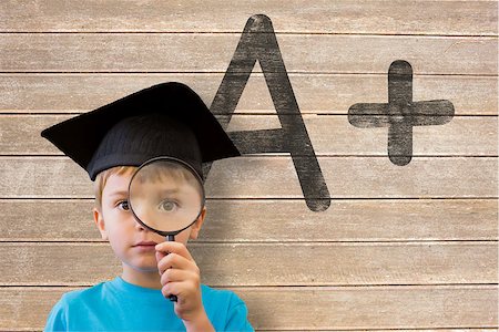 simsearch:400-07683875,k - Cute pupil looking through magnifying glass against wooden surface with planks Foto de stock - Super Valor sin royalties y Suscripción, Código: 400-07684109