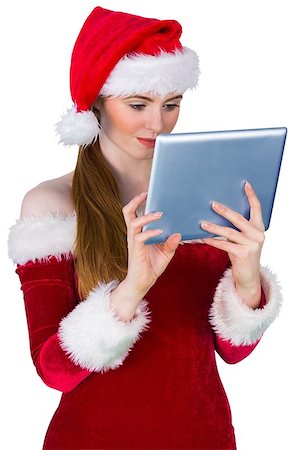 simsearch:693-06021827,k - Pretty santa girl using tablet pc on white background Foto de stock - Super Valor sin royalties y Suscripción, Código: 400-07684238