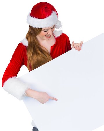 simsearch:693-06021827,k - Pretty girl in santa costume showing card on white background Foto de stock - Super Valor sin royalties y Suscripción, Código: 400-07684246