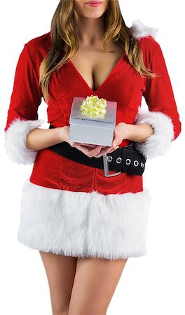 Sexy santa girl holding gift on white background Stock Photo - Budget Royalty-Free & Subscription, Code: 400-07684250