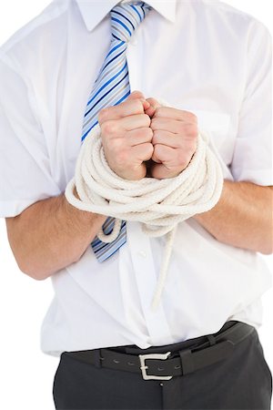 shirt tight man - Businessman tied up in rope on white background Stock Photo - Budget Royalty-Free & Subscription, Code: 400-07685406