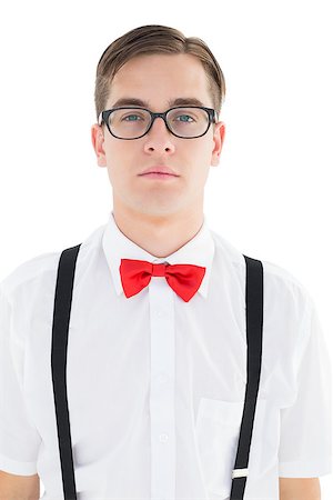 simsearch:400-07778671,k - Nerdy hipster looking at camera  on white background Fotografie stock - Microstock e Abbonamento, Codice: 400-07685554