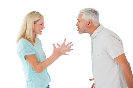 simsearch:400-07685942,k - Unhappy couple having an argument on white background Photographie de stock - Aubaine LD & Abonnement, Code: 400-07685925