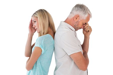 simsearch:400-07726420,k - Unhappy couple not speaking to each other on white background Fotografie stock - Microstock e Abbonamento, Codice: 400-07685936