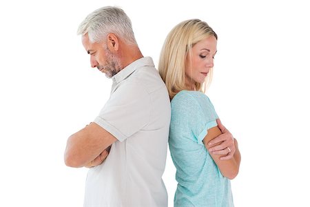 simsearch:400-07726420,k - Unhappy couple not speaking to each other on white background Fotografie stock - Microstock e Abbonamento, Codice: 400-07685939