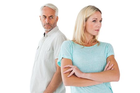 simsearch:400-07685942,k - Unhappy couple not speaking to each other on white background Photographie de stock - Aubaine LD & Abonnement, Code: 400-07685946