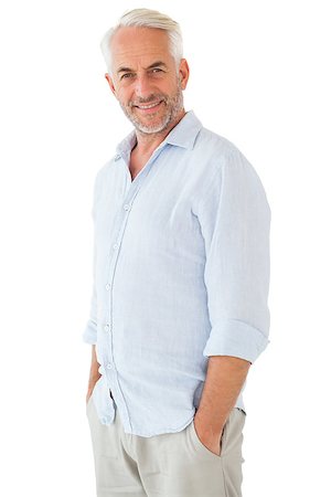 Smiling man posing with hands in pockets on white background Stock Photo - Budget Royalty-Free & Subscription, Code: 400-07686082