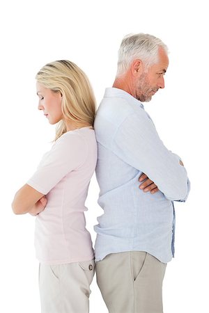 simsearch:400-07726578,k - Unhappy couple not speaking to each other on white background Fotografie stock - Microstock e Abbonamento, Codice: 400-07686093