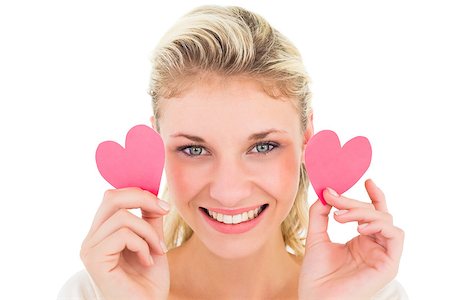 simsearch:400-07686530,k - Attractive young blonde holding little hearts on white background Foto de stock - Royalty-Free Super Valor e Assinatura, Número: 400-07686523