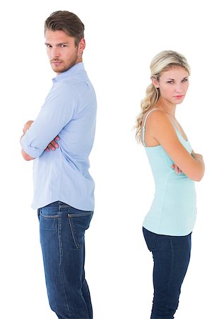 simsearch:400-07726578,k - Unhappy couple not speaking to each other on white background Fotografie stock - Microstock e Abbonamento, Codice: 400-07686553