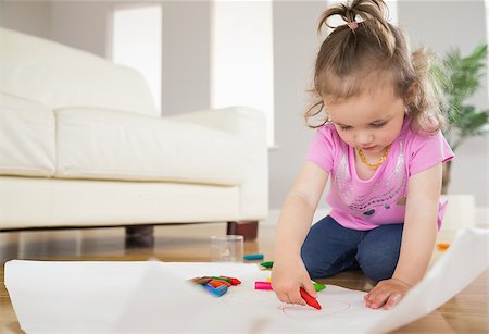 simsearch:6109-07601494,k - Little girl drawing in the living room at home Stock Photo - Budget Royalty-Free & Subscription, Code: 400-07687111