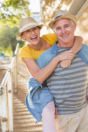 senior women city fun - Happy mature couple having fun in the city on a sunny day Stock Photo - Budget Royalty-Free & Subscription, Code: 400-07687797