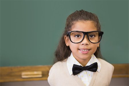 simsearch:400-07684082,k - Cute pupil dressed up as teacher in classroom at the elementary school Stock Photo - Budget Royalty-Free & Subscription, Code: 400-07688904