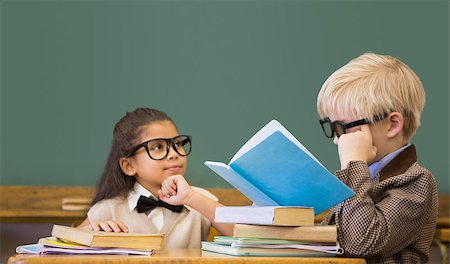 Cute pupils dressed up as teachers in classroom at the elementary school Stock Photo - Budget Royalty-Free & Subscription, Code: 400-07688905