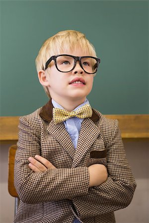 simsearch:400-07684082,k - Cute pupil dressed up as teacher in classroom at the elementary school Stock Photo - Budget Royalty-Free & Subscription, Code: 400-07688902