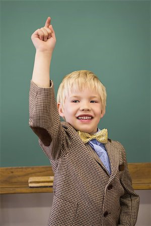 simsearch:400-07684082,k - Cute pupil dressed up as teacher in classroom at the elementary school Stock Photo - Budget Royalty-Free & Subscription, Code: 400-07688903