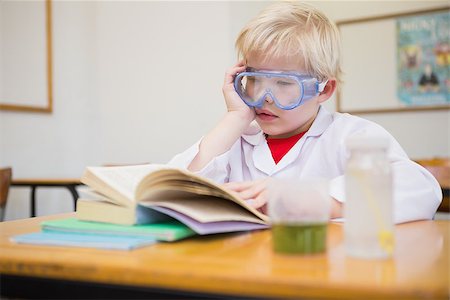 simsearch:400-07684082,k - Cute pupil dressed up as scientist in classroom at the elementary school Stock Photo - Budget Royalty-Free & Subscription, Code: 400-07688936