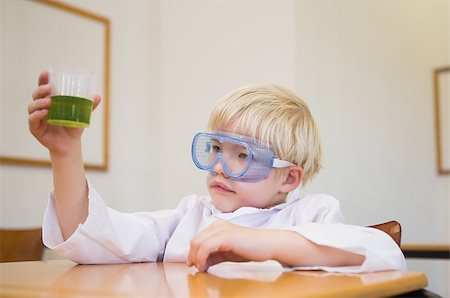 simsearch:400-07684082,k - Cute pupil dressed up as scientist in classroom at the elementary school Stock Photo - Budget Royalty-Free & Subscription, Code: 400-07688932