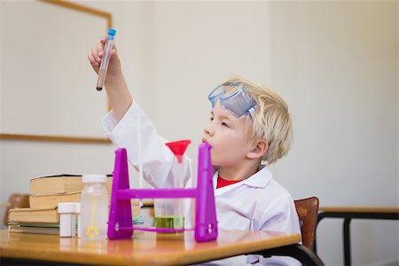 simsearch:400-07684082,k - Cute pupil dressed up as scientist in classroom at the elementary school Stock Photo - Budget Royalty-Free & Subscription, Code: 400-07688933