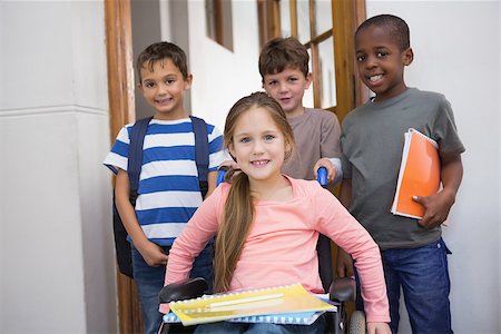 simsearch:400-07991158,k - Disabled pupil with his friends in classroom at the elementary school Stock Photo - Budget Royalty-Free & Subscription, Code: 400-07689007