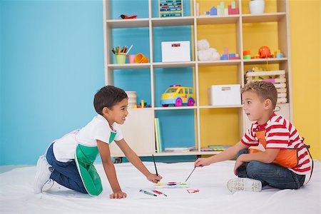 daycare on floor - Cute little boys painting on floor in classroom at the nursery school Stock Photo - Budget Royalty-Free & Subscription, Code: 400-07689168